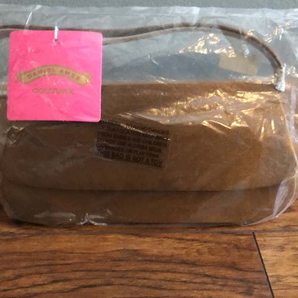 BRAND NEW BRONZE CLUTCH PURSE IT IS SMALL! NEW WITH TAGS ON IT! SMOKE FREE HOME - Picture 8 of 8